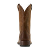 Brown cowboy boot on a white background