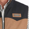 Close-up of a two-tone vest with a brand logo on a white background