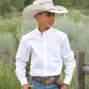 Young boy wearing a white shirt and cowboy hat in a natural setting