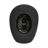 Black cowboy hat with a patterned interior on a white background