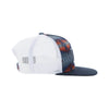 Trucker hat with white front panel and patterned side on a white background