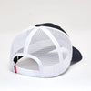 Black and white cap with mesh back on a light gray background