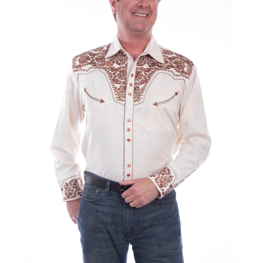 Man wearing a white western-style shirt with brown embroidery on a white background