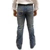 Person wearing blue jeans and a white shirt on a white background