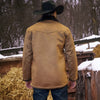 Person wearing a brown leather jacket and black cowboy hat standing in a snowy outdoor setting.