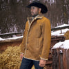Man wearing a tan shearling jacket and cowboy hat in a snowy rural setting.