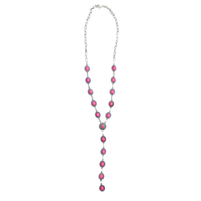 Necklace with pink beads on a white background