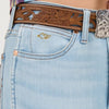 Light blue jeans with a decorative brown belt and silver buckle.